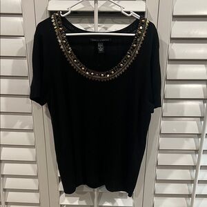Elegant Black Top with Gold Accents